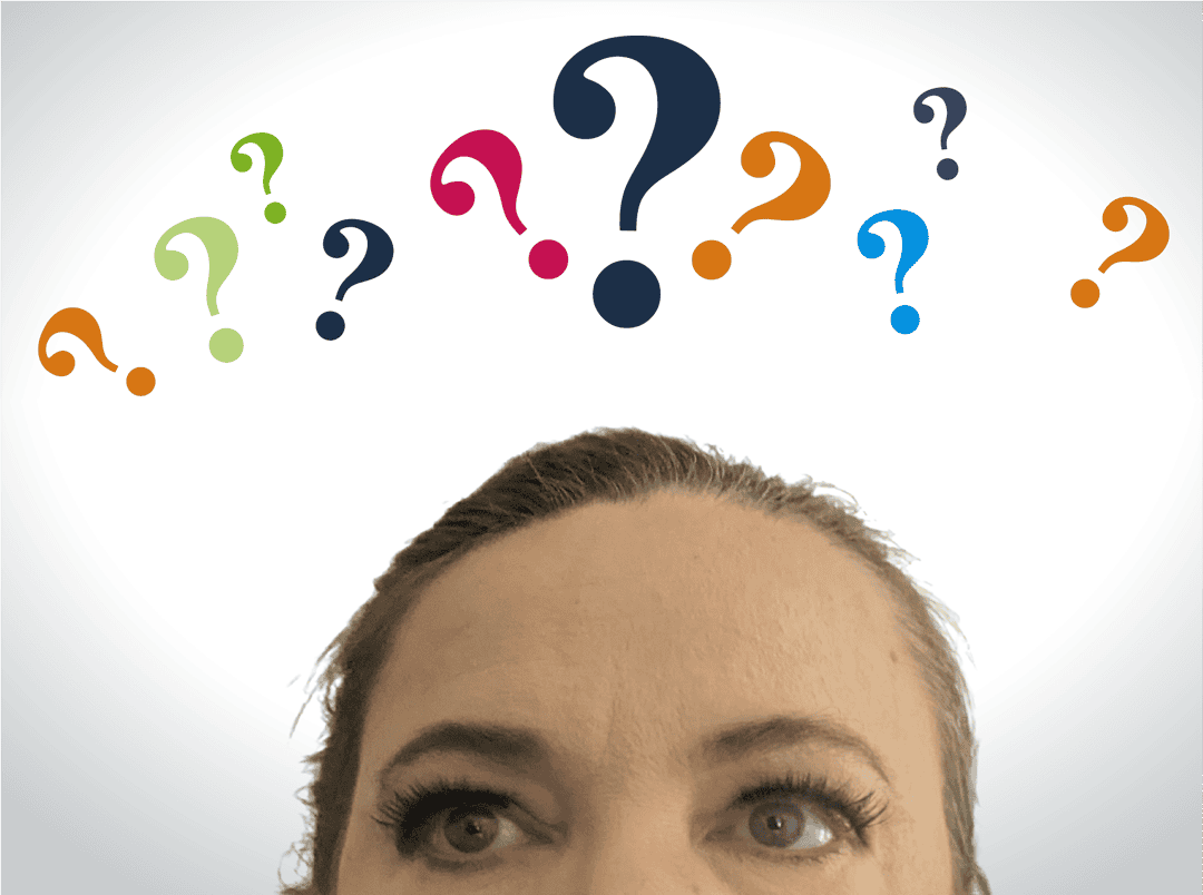 web designer looking up at many question marks